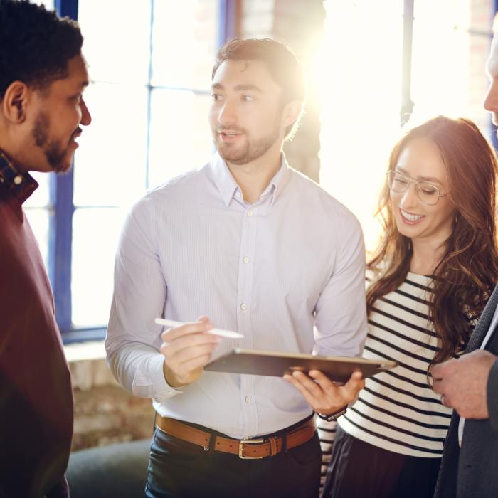 group of employees discussing