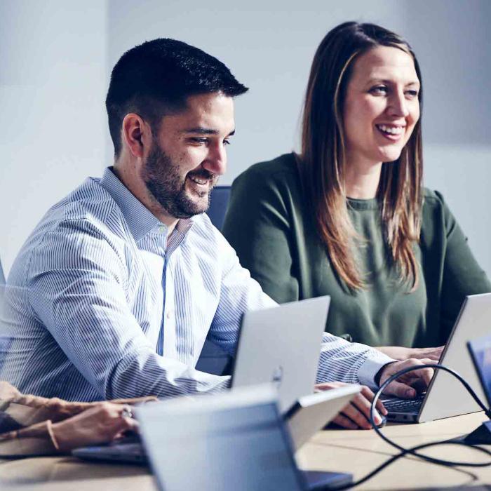 Two digital marketers at a meeting in Rockefeller