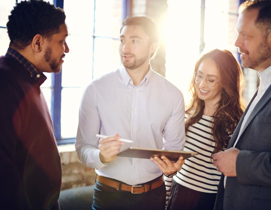 group of employees discussing